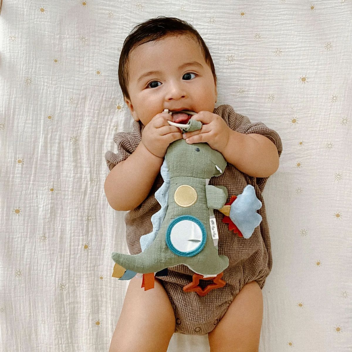 Itzy Ritzy Bitzy Traveler Developmental Sensory Toy - Dino - Perfect for On the Go Use