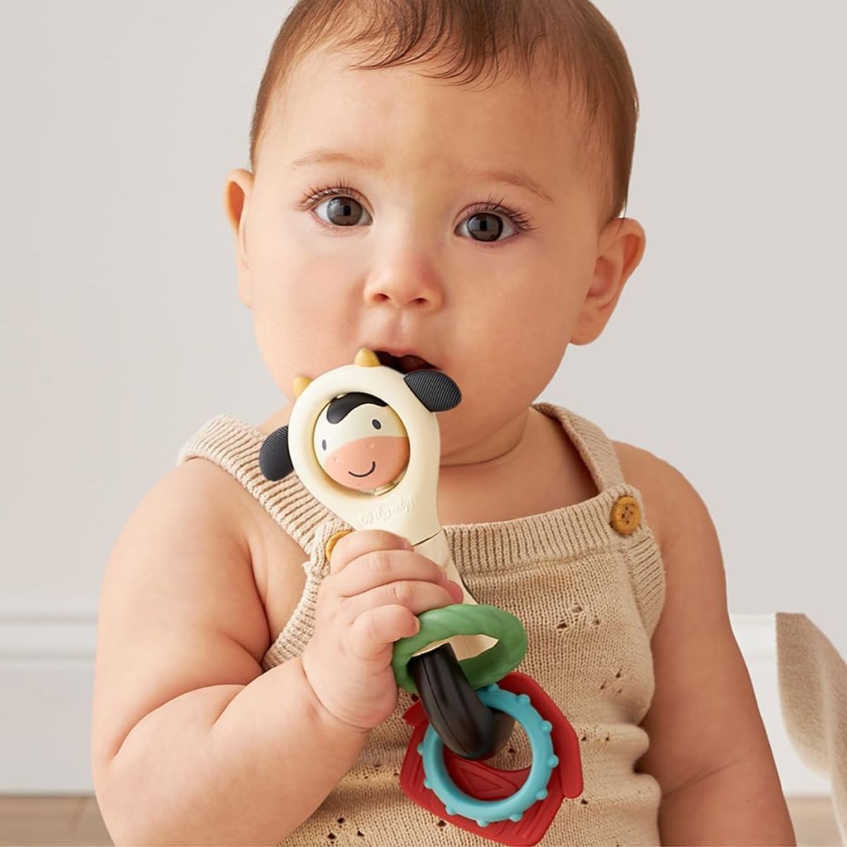 Itzy Ritzy Spinner Rattle - Carmen the Cow - Encourages Early Development